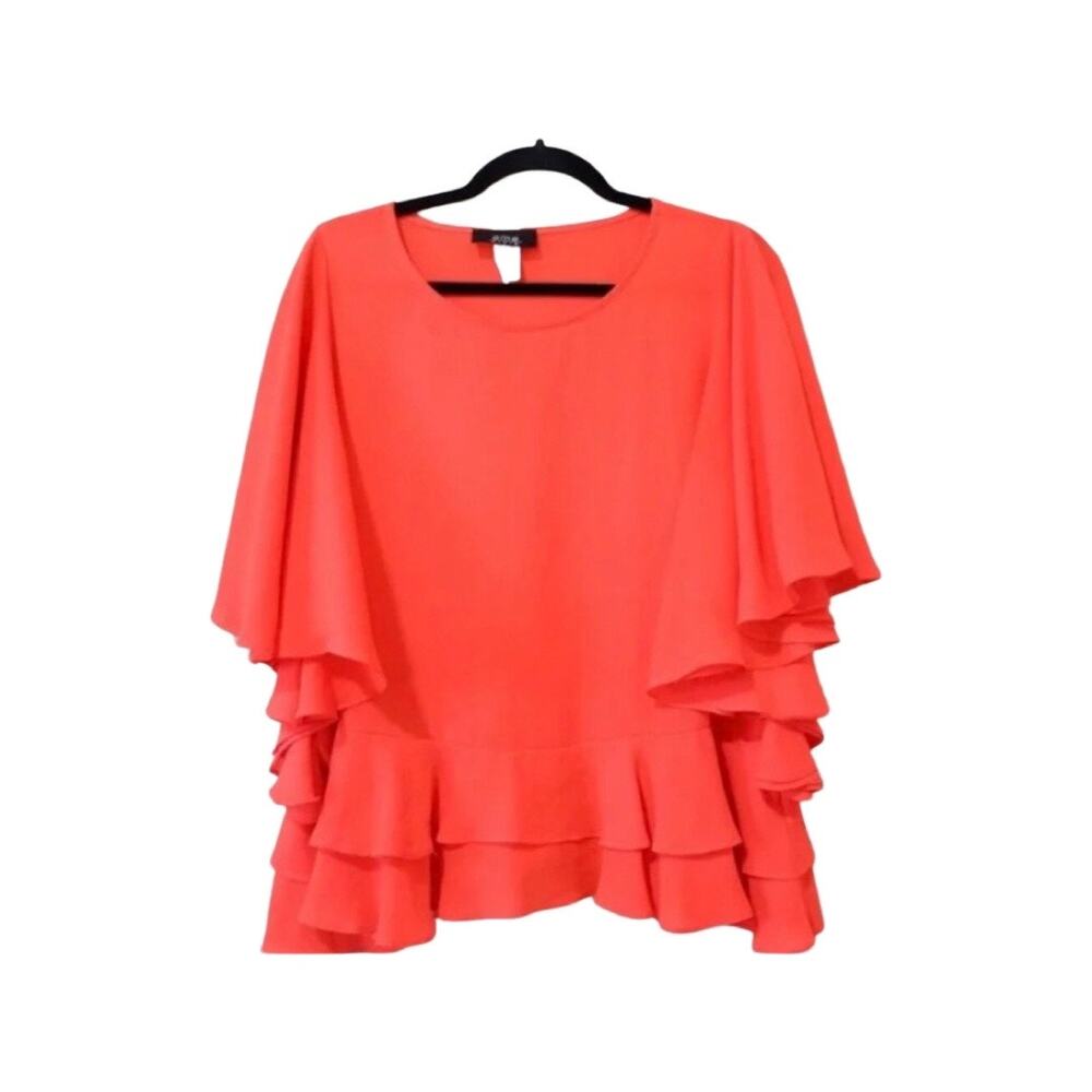 Eme Style Blouse with ruffle end and bell sleeves.